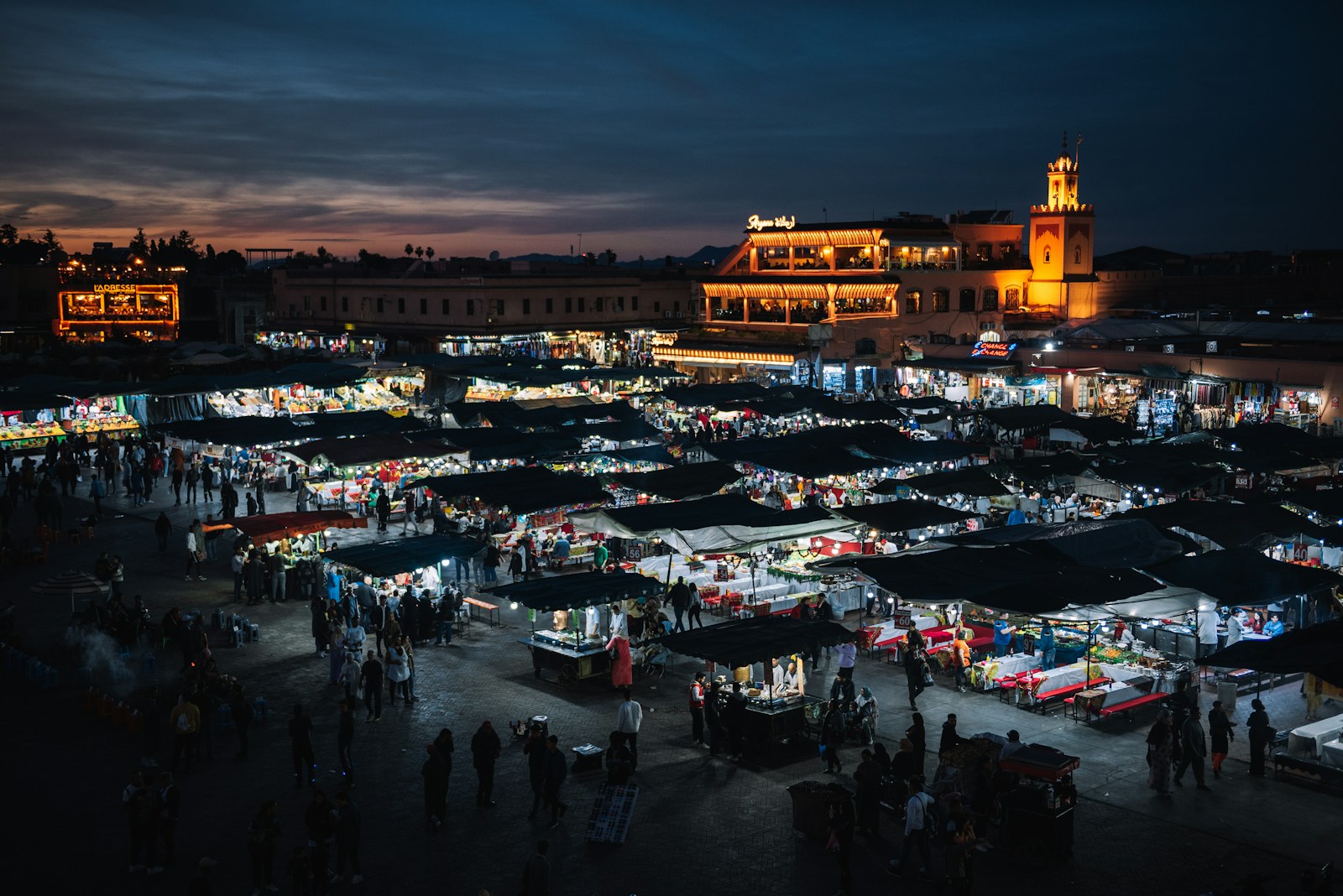 An aerial view of a market at night
